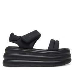 Sandały GOE. Czarne sandały GOE, bez wzorów, bez obcasa, na koturnie, bez zapięcia. Za 349.99 zł.