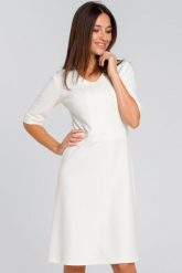 Elegancka sukienka dzianinowa trapezowa midi z dekoltem V ecru kremowa. Białe sukienki Sukienki.shop, do pracy, l, bez wzorów, z bawełny, biznesowe, bez kołnierzyka, bez ramiączek, midi, proste. Za 249.00 zł.