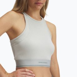 Top treningowy damski Under Armour Meridian Rib Branded Tank hydro. Zielone topy Under Armour, bez wzorów, bez kołnierzyka, bez ramiączek. Za 129.99 zł.