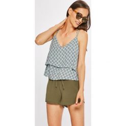 Review - Top. Niebieskie topy Review, l, bez wzorów, z tkaniny, bez kołnierzyka, bez ramiączek. W wyprzedaży za 49.90 zł.