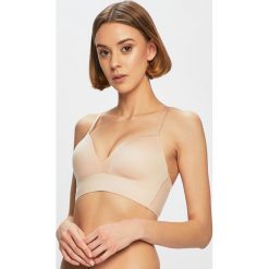 Triumph - Biustonosz. Niebieskie biustonosze Triumph, bez wzorów, z elastanu. W wyprzedaży za 119.90 zł.