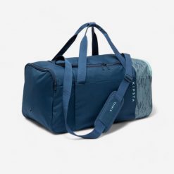 Torba sportowa Kipsta Essential 55 l. Niebieskie torby na ramię DECATHLON, bez wzorów, z materiału, sportowe, na ramię, średnie, bez dodatków. Za 69.99 zł.