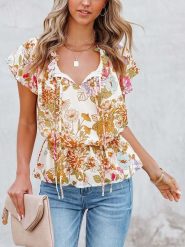 Milan Kiss Bluzka w kolorze kremowym ze wzorem rozmiar: M. Brązowe bluzki Milan Kiss, m, bez wzorów, bez kołnierzyka, bez ramiączek. Za 109.78 zł.