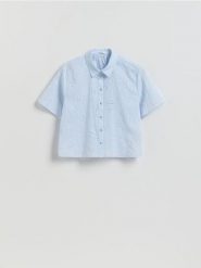 Ażurowa koszula - jasnoniebieski. Niebieskie koszule Reserved, l, w ażurowe wzory, z bawełny, bez kołnierzyka, bez ramiączek. Za 109.99 zł.