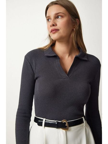 Happiness Istanbul Bluzka w kolorze czarnym rozmiar: S/M. Czarne bluzki Happiness Istanbul, m, bez wzorów, bez kołnierzyka, bez ramiączek. Za 48.05 zł.