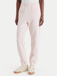 Lacoste Spodnie dresowe XF5244 Różowy jasny Regular Fit. Czerwone spodnie dresowe Lacoste, bez wzorów, z bawełny. Za 639.99 zł.