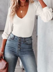 Milan Kiss Bluzka w kolorze białym rozmiar: L. Białe bluzki Milan Kiss, l, bez wzorów, bez kołnierzyka, bez ramiączek. Za 126.99 zł.