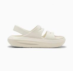 Sandały PUMA Flatter Beżowe. Brązowe sandały Puma, bez wzorów, z materiału, sportowe, bez obcasa, bez zapięcia. Za 158.95 zł.