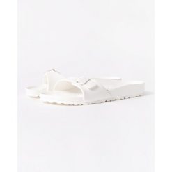 Klapki damskie Birkenstock Eva Madrid. Białe klapki Birkenstock, bez wzorów, z materiału, bez obcasa. Za 279.00 zł.