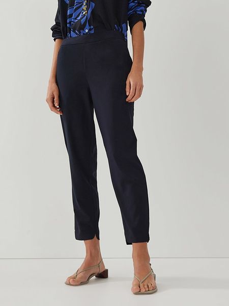 Someday Spodnie "Charlie" w kolorze granatowym rozmiar: 42. Niebieskie spodnie materiałowe someday., bez wzorów, z materiału. Za 148.61 zł.