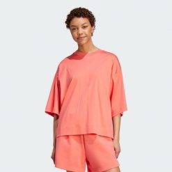 Luźna koszulka Soft Lux. Brązowe bluzki Adidas, xs, bez wzorów, sportowe, bez kołnierzyka, bez ramiączek. W wyprzedaży za 129.35 zł.