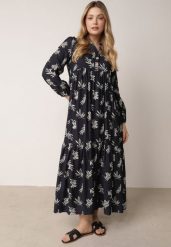 Niebieska Rozkloszowana Sukienka z Wiskozy z Dekoltem na Guziki Watesa. Niebieskie sukienki Born2be, na co dzień, l, bez wzorów, z materiału, boho, bez kołnierzyka, bez ramiączek, maxi, proste. Za 129.99 zł.