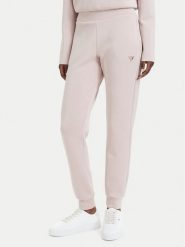 Guess Spodnie dresowe V4YB08 KCAY2 Różowy jasny Regular Fit. Czerwone spodnie dresowe Guess, m, z aplikacjami, z dresówki. Za 344.99 zł.