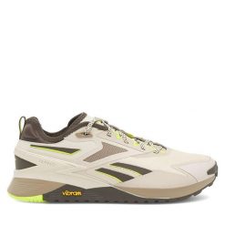 Buty na siłownię Reebok. Brązowe obuwie sportowe Reebok, bez zapięcia, na fitness i siłownię. Za 279.99 zł.