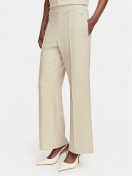 Calvin Klein Spodnie materiałowe LV044G210G Beżowy Wide Leg. Brązowe spodnie materiałowe Calvin Klein, s, bez wzorów, z materiału. Za 359.99 zł.