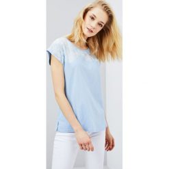 Bluzka oversize. Bluzki MOODO, l, bez wzorów, bez kołnierzyka, bez ramiączek. Za 9.99 zł.