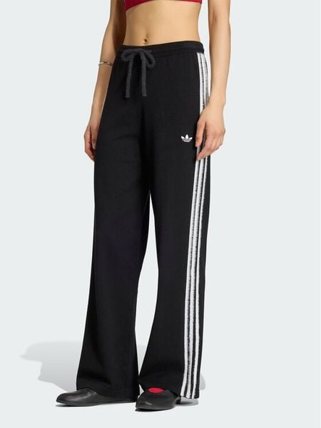 Adidas Spodnie dresowe Firebird KS9363 Czarny Regular Fit. Czarne spodnie dresowe Adidas, s, bez wzorów, z dresówki. Za 279.99 zł.