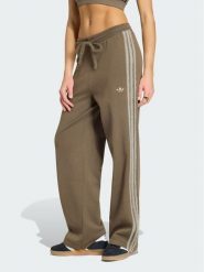 Adidas Spodnie dresowe Firebird KS7362 Brązowy Regular Fit. Brązowe spodnie dresowe Adidas, xs, bez wzorów, z dresówki. Za 314.99 zł.
