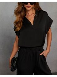 Milan Kiss Bluzka w kolorze czarnym rozmiar: M. Czarne bluzki Milan Kiss, m, bez wzorów, bez kołnierzyka, bez ramiączek. Za 126.99 zł.