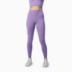 Legginsy Girlfriend Collective Compressive. Fioletowe legginsy GIRLFRIEND COLLECTIVE, bez wzorów. Za 209.99 zł.