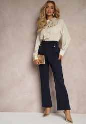 Granatowo-Beżowy Kombinezon z Koszulową Górą Zdobiony Wiązaniem i Eleganckimi Guzikami Eliti. Niebieskie sukienki Renee, do pracy, l, z aplikacjami, biznesowe, bez kołnierzyka, bez ramiączek, koszulowe. Za 149.99 zł.