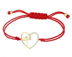 Bransoletka z cyrkoniami i elementami z żółtego złota - serce, ważka. Żółte bransoletki Apart, z cyrkonią, złote. Za 699.00 zł.