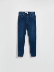 Jeansy slim mid rise - granatowy. Niebieskie jeansy Reserved, bez wzorów. Za 99.99 zł.