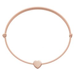 Bransoletka z sercem Etincelle, różowe pozłocenie, na cienkim łososiowym sznurku. Czerwone bransoletki Lilou, pozłacane. Za 79.00 zł.