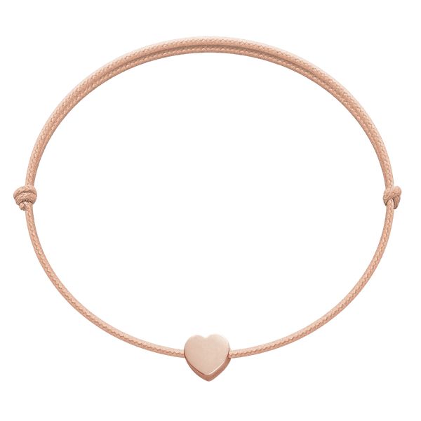 Bransoletka z sercem Etincelle, różowe pozłocenie, na cienkim łososiowym sznurku. Czerwone bransoletki Lilou, pozłacane. Za 79.00 zł.