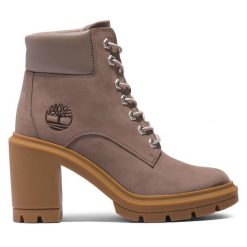 Trzewiki Timberland. Brązowe botki Timberland, bez wzorów, bez obcasa, na słupku, bez zapięcia. Za 619.99 zł.