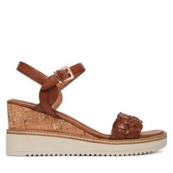 Sandały Tamaris. Brązowe sandały Tamaris, bez wzorów, bez obcasa, na koturnie, bez zapięcia. Za 409.99 zł.
