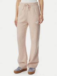 Adidas Spodnie dresowe Essentials KR9180 Beżowy Loose Fit. Brązowe spodnie dresowe Adidas, xs, bez wzorów, z bawełny. Za 299.99 zł.