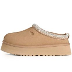 Ugg Australian W Tazz Ii Kapcie Damskie. Brązowe obuwie domowe UGG, bez wzorów, ze skóry, bez zapięcia. Za 589.80 zł.