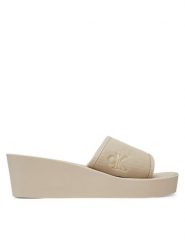 Calvin Klein Jeans Klapki Beach Wedge Slide Canvas YW0YW01725 Beżowy. Brązowe klapki Calvin Klein Jeans, bez wzorów, z jeansu, bez obcasa. Za 139.99 zł.