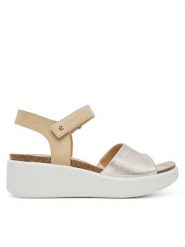 ECCO Sandały Flowt Wedge 27231360704 Złoty. Żółte sandały ecco, bez wzorów, ze skóry, bez obcasa, na koturnie, bez zapięcia. Za 599.99 zł.