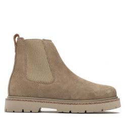 Sztyblety Birkenstock. Brązowe botki Birkenstock, bez wzorów, bez obcasa, na płaskiej podeszwie, bez zapięcia. Za 899.99 zł.