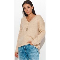 Numinou Sweter w kolorze beżowym rozmiar: onesize. Brązowe swetry Numinou, bez wzorów, z wełny, bez ramiączek. Za 75.03 zł.