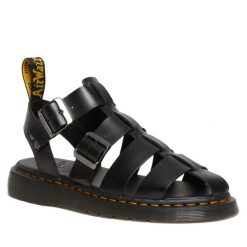 Sandały Dr. Martens. Czarne sandały Dr. Martens, bez wzorów, bez obcasa, na płaskiej podeszwie, bez zapięcia. Za 559.99 zł.