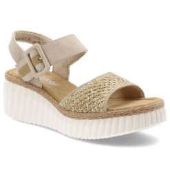 Beżowe Sandały Rieker Stylowe Obuwie Damskie Na Koturnie. Brązowe sandały Rieker, bez wzorów, z materiału, eleganckie, bez obcasa, na koturnie, bez zapięcia. Za 329.00 zł.