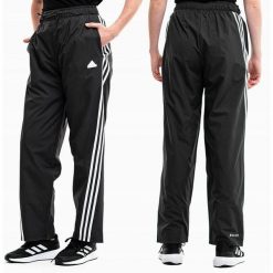 Adidas spodnie dresowe damskie sportowe treningowe Future Icons. Czarne spodnie dresowe Adidas, bez wzorów, z dresówki. Za 229.99 zł.