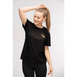 T-shirt do jogi Moonholi Awaken z krótkim rękawem. Czarne t-shirty MOONHOLI, xs, bez wzorów, bez kołnierzyka, bez ramiączek. Za 99.00 zł.