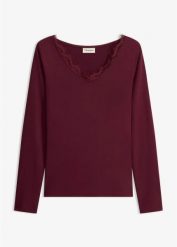 Koszulka z dżerseju z koronką z dekoltem w serek. Czarne bluzki bonprix, bez wzorów, z dżerseju, eleganckie, bez kołnierzyka, bez ramiączek. Za 69.99 zł.