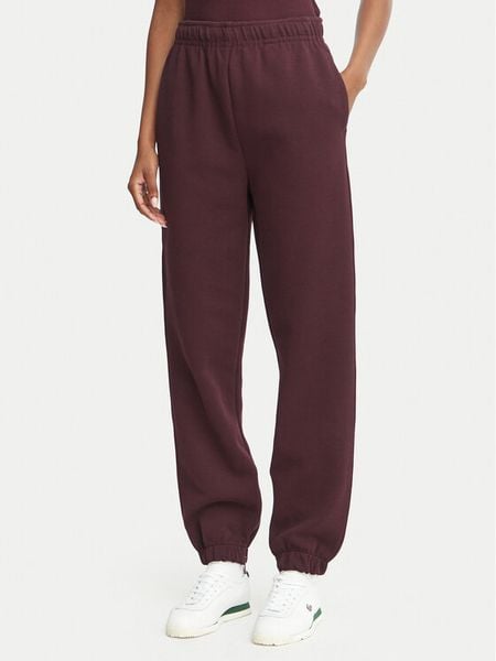 Lacoste Spodnie dresowe XF5244 Bordowy Regular Fit. Czerwone spodnie dresowe Lacoste, bez wzorów, z dresówki. Za 639.99 zł.