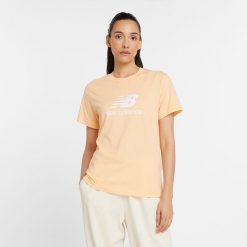 Koszulka damska New Balance WT41502PAE – pomarańczowa. Brązowe koszulki sportowe New Balance, bez wzorów, z materiału, bez ramiączek. Za 69.99 zł.