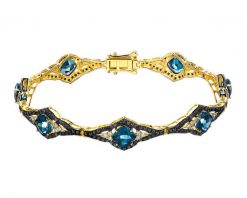 Bransoletka z żółtego złota z brylantami i topazami London Blue - 18 cm - próba 585. Niebieskie bransoletki Apart, z brylantem, złote. Za 20,990.00 zł.