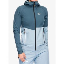 Kurtka softshell damska Ortovox Punta Berrino Hooded Jacket. Niebieskie kurtki sportowe ORTOVOX, bez wzorów, z softshellu, bez kaptura, trekkingowe. Za 962.49 zł.