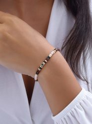 Luja Bijoux Pozłacana bransoletka z syntetycznymi perłami rozmiar: onesize. Brązowe bransoletki Luja Bijoux, z perłą, pozłacane. Za 66.45 zł.