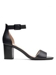 Clarks Skórzane sandały "Deva Mae" w kolorze czarnym rozmiar: 37,5. Czarne sandały Clarks, bez wzorów, z otwartym noskiem, bez obcasa, na koturnie, bez zapięcia. Za 158.84 zł.