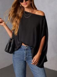 Milan Kiss Bluzka w kolorze czarnym rozmiar: L. Czarne bluzki Milan Kiss, l, bez wzorów, bez kołnierzyka, bez ramiączek. Za 140.20 zł.