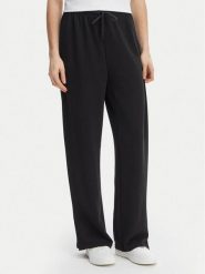 ONLY Spodnie materiałowe Maya 15369156 Czarny Loose Fit. Czarne spodnie materiałowe Only, s, bez wzorów, z materiału. Za 169.99 zł.